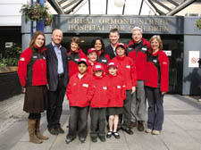 Adults from left: Emma Scrase, John Caudwell, Professor Janet Stocks, Dr Samantha Sonnappa, Dr Mike Grocott, Professor Mothy Mythen, Kate Mythen with children from left: Mayank Naik (6), Charlotte Mythen (11), Tom Mythen (6), Alice Mythen (8) and Patrick