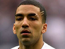 Aaron Lennon limped off shortly before Spurs went down to a disappointing home defeat to Stoke City